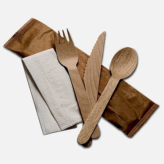 Eco Leaf Products Set of wooden cutlery including knife, fork, spoon, and napkins on a white background
